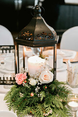 black wedding lantern with florals and candle