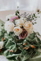 white and purple roses for wedding table decor