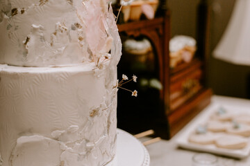 Details of gold floral wedding cake