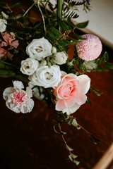 spring time floral arrangement with roses and carnations