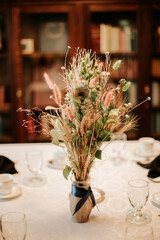 rustic wedding florals arrangement with prairie grasses