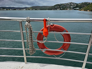 Lifebuoy and turn signal on the ship and a flashlight