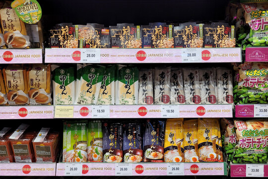 Penang, Malaysia - 11 JAN 2024: Aeon grocery store displays a shelf with a wide variety of Japanese brand instant food and ramen noodles, offering numerous choices.