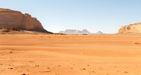 Fototapeta na wymiar an empty dirt plain with desert rock and sparse ground