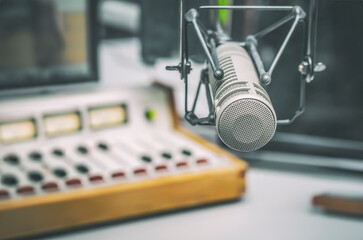 Professional microphone and sound mixer in radio station studio