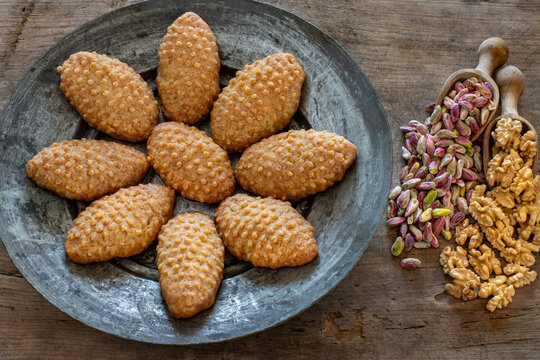 Dessert with syrup named kalburabastı or kalburabasti . Many pieces of delight in the plate.