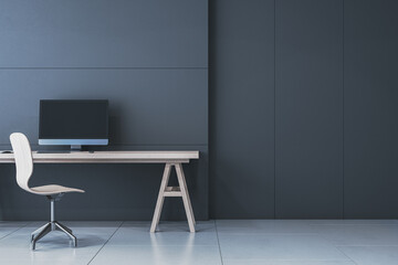 Modern minimalistic black interior with workplace and computer monitor, mock up place on wall. 3D Rendering.