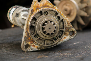 Old worn out diesel engine starter, view from the working part - obrazy, fototapety, plakaty