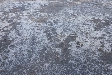 Surface, texture, background, slippery road in a winter day.