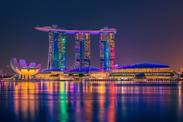 Glowing Skyscrapers and Luminous Waterfront A Spectacular Nighttime View of the Marina Bay Sands Generative AI