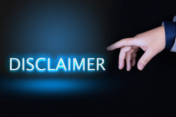 DISCLAIMER text, word written in neon letters on a black background pointed to by a hand with a...
