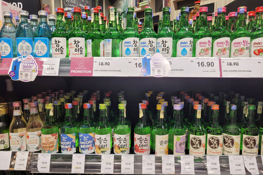 Penang, Malaysia - 22 JAN 2024: Assortment Korea soju and hard liquor bottles on store shelves in Aeon Grocer store. Korean soju is a traditional alcoholic drink from Korea, usually made from rice.