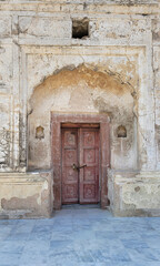 Old wooden door in a wall, Katas raj temple door