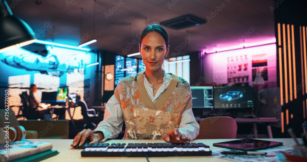 Aufkleber Portrait of a Female Software Developer Writing Code in a Creative Office with Neon Lights. Young Woman Focused on Typing on Keyboard and Working on Desktop Computer. Point of View of Screen Monitor 