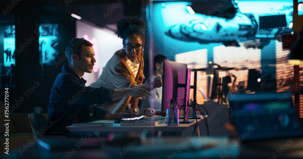 Poster Portrait of Black Creative Director Giving Instructions on 3D Game Visuals to Male Developer in Creative Agency. Two Stylish Diverse Employees Discussing Design on Computer in Game Development Company