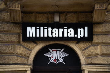 Obraz premium Militaria.pl logo sign above the store entrance. Polish online retailer of military gear, outdoor equipment, tactical clothing for enthusiasts and professionals on February 15, 2024 in Krakow, Poland.