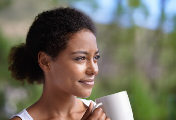 Thinking, coffee and woman on a balcony with peace, reflection or enjoying a calm moment. Face, remember and female person on a terrace with tea, idea or happy, memory or insight with view of nature