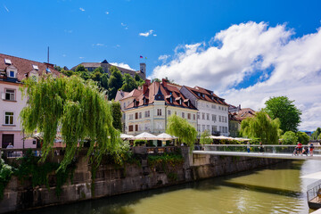 Ljubljana, Slovenia - June 27, 2023: Waterfront of Ljubljanica River in Ljubljana, Slovenia.