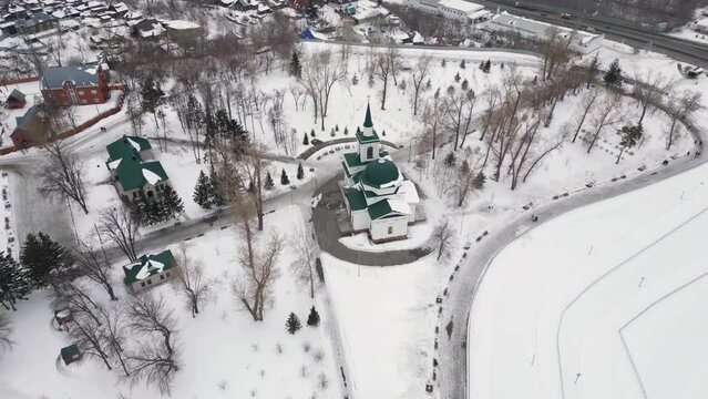 Aerial view of Christian chapel on the mountain in winter day, Barnaul, Russia