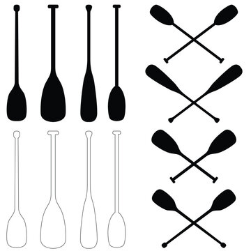 Set of boat paddle silhouettes,. Crossed boat paddle 