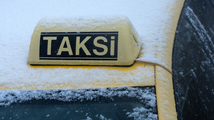 sign on the taxi car