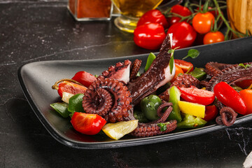 Salad with octopus tentacle and vegetables