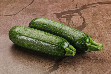 Raw green ripe zucchini vegetable
