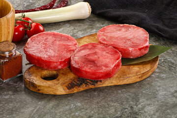 Delicous raw tuna medallion for cooking