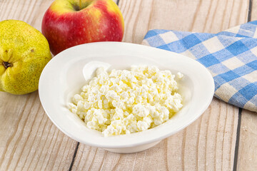 Organic cottage cheese in the bowl