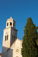 Fototapeta na wymiar Belltower of St. Nicholas' church, Cavtat, Dubrovnik-Neretva, Croatia