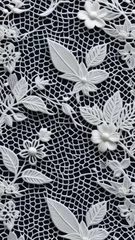 Abwaschbare Fototapete  white lace pattern with beads against black background, floral design. concepts: textile backgrounds and textures, elegant fabrics, bridal lace, romantic lace, handmade, backdrop for elegant themes © Indi