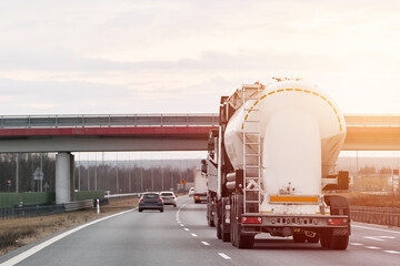 Fuel oil carrier truck driving on highway. It transports gas and lpg.