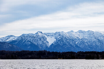 View over the Staffelsee and the island of Wörth with the St Simpert chapel to the Kochel mountains in the Alps