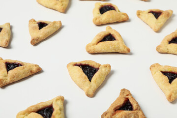 A mask with traditional cookies for the day of Purim.