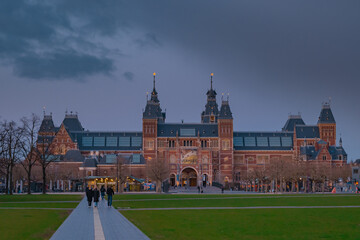 Netherlands, March 28 2023: Amsterdam at summer night. Famous national Rijks museum general view at...