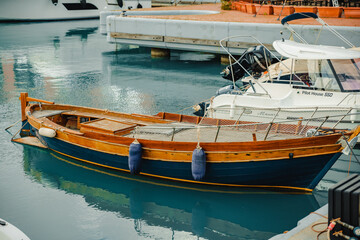 Port of Genoa with and old and a modern boad