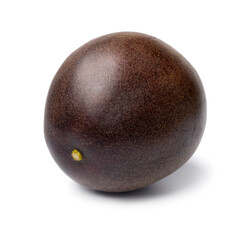Single fresh whole passion fruit close up isolated on white background