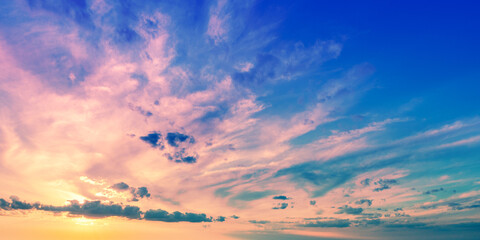 Colorful cloudy sky at sunset. Gradient color. Sky texture. Abstract nature background. Horizontal banner