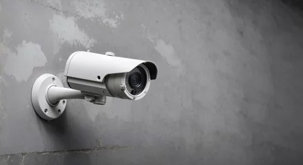 Fototapeten CCTV, Bullet outdoor camera, security camera installed on the wall, recording scene outside, protection and safety for building © sonderstock