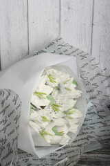 Bouquet of white lilies. Marshmallow bouquet. Marshmallow flowers. Homemade marshmallows.