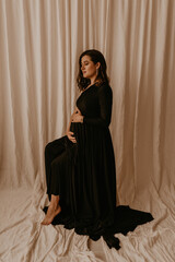 an incredibly beautiful married couple Expecting child, pregnant wife.