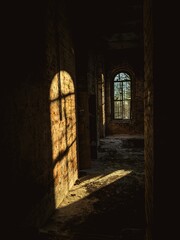 Vaulted red brick dungeon under old castle.