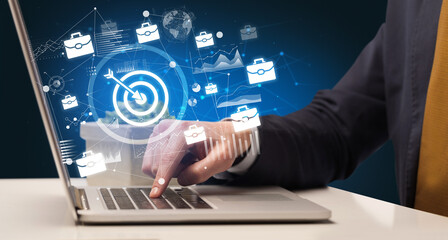 Business hand working on laptop, successful business concept