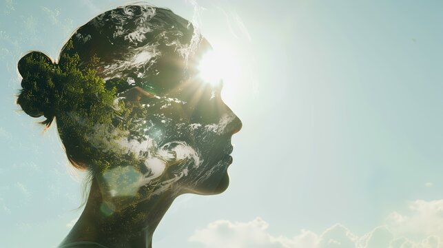 Double exposure of woman's face and green planet. Elements of this image are furnished by NASA