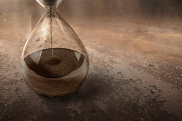 Flowing sand in the hourglass