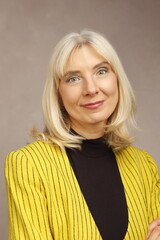 woman in yellow jacket branding photo