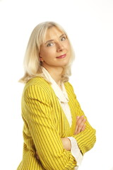 blond woman in her 50s posing