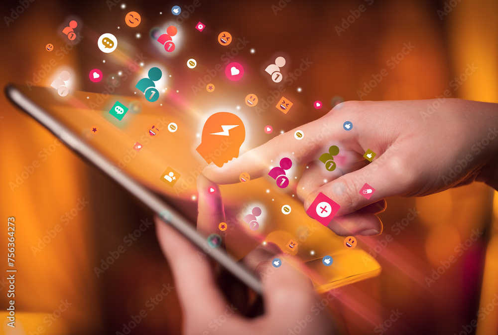 Aufkleber close-up of a hand using tablet with social media icons