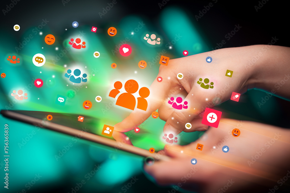 Aufkleber close-up of a hand using tablet with social media icons