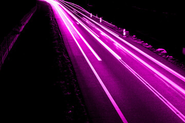 violet car lights at night. long exposure